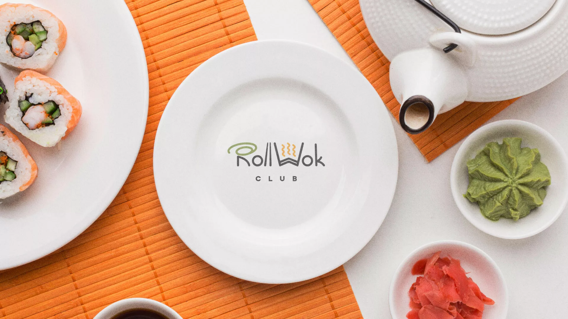Разработка логотипа и фирменного стиля в Хасавюрте для суши-бара «Roll Wok Club» Разработка логотипа и фирменного стиля в Хасавюрте для суши-бара «Roll Wok Club»
